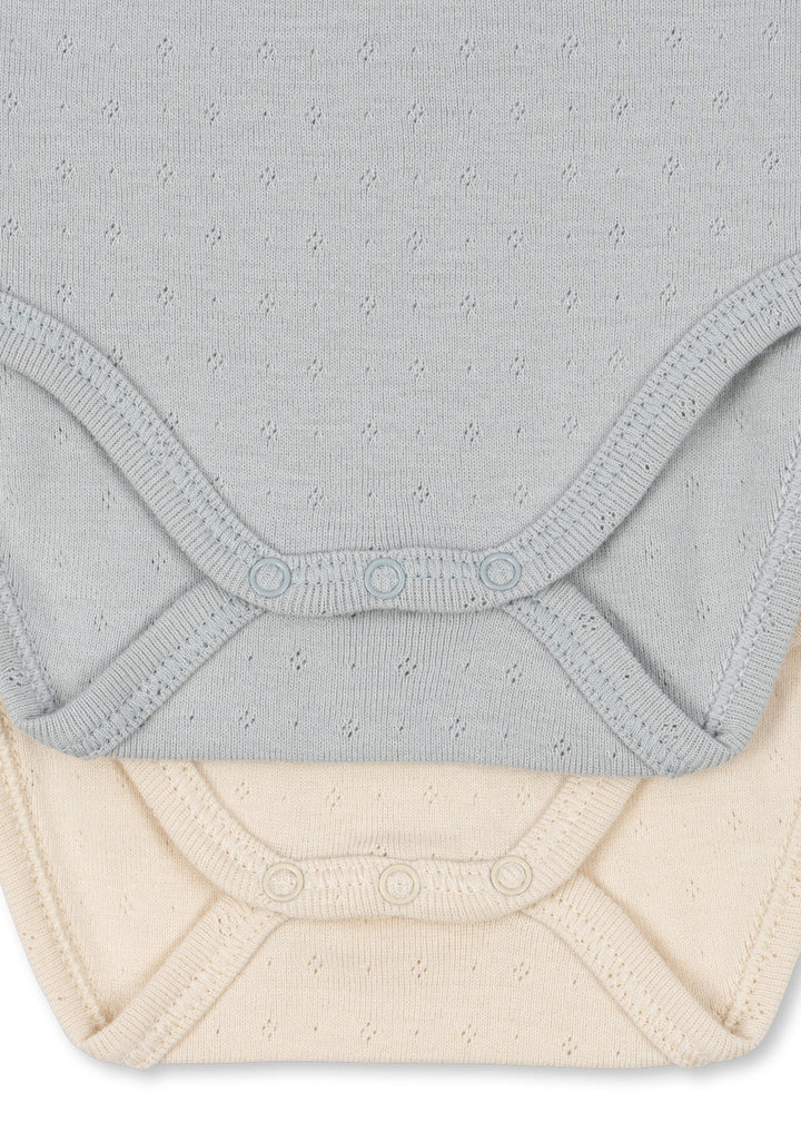 Fanga Fontana by Konges Sløjd – 2-pakning body Perla – Buttercream/Pearl Blue